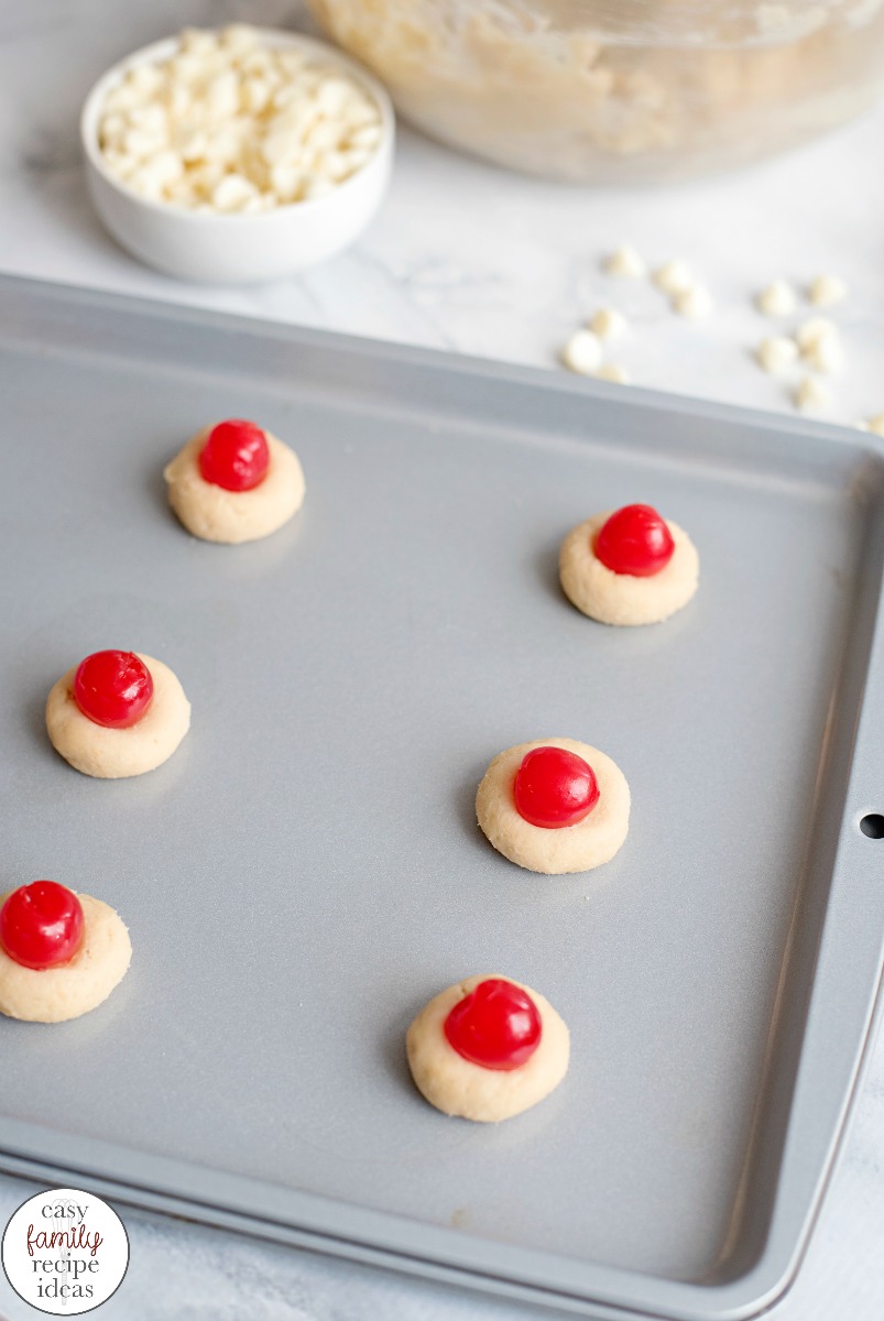The Best Cherry Thumbprint Cookie Recipe you'll ever taste! Cherry Almond Cookies, Maraschino Cherry Thumbprint Cookies This Thumbprint Cookie Recipe Can easily be changed for any flavor filling! They make perfect Christmas Cookies too! 