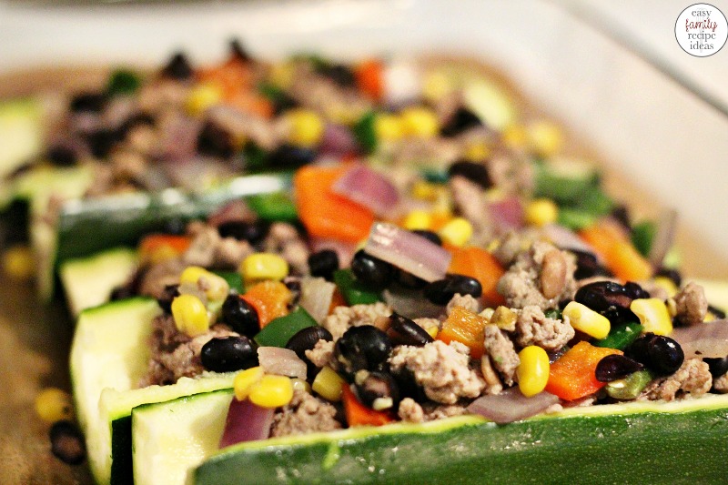 Make this Healthy Taco Recipe, and your friends and family will love you for it. Taco Zucchini Boats, Healthy ground turkey recipe, delicious spicy taco zucchini boats are a healthy dinner idea. Stuffed taco zucchini boats for Taco Tuesday, This Mexican zucchini boat is good for you.