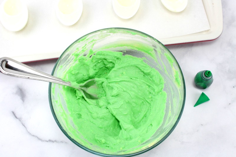 Everyone will eat and enjoy this Green Eggs and Ham Recipe, Avocado Deviled Eggs are a healthy spin on classic deviled eggs pair it with Dr. Seuss Birthday Party Ideas, Dr. Seuss Activities, or any Dr Seuss Party Food. Everyone Loves Green Eggs and Ham Food Ideas