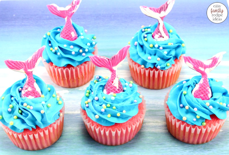 These Mermaid Cupcakes are a perfect sweet summer treat, They are easy to make and look amazing for a Summer Party. Serve EASY Mermaid cupcakes for an ocean theme party, Under the Sea Theme or fur the cutest Mermaid Tail Cupcakes Ever!  