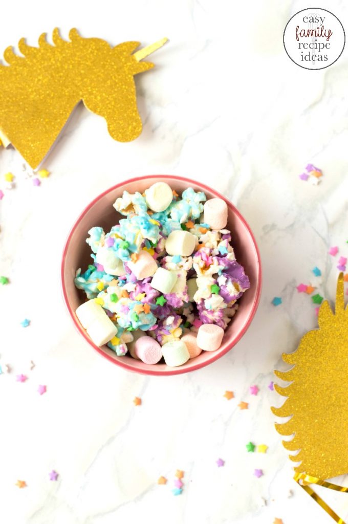 How To Make Unicorn Popcorn, This Easy Unicorn Popcorn makes a fun and delicious party snack. Serve this colorful treat for your child's unicorn theme birthday party or Sleepover treat, kids and adults will love how delicious this popcorn recipe is. Perfect for a Mermaid Theme too! 
