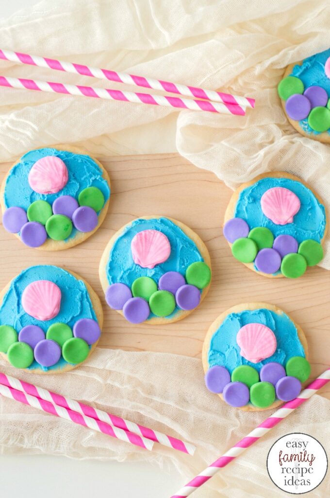 Bring on all of the little mermaids and serve them Mermaid Cookies for your next ocean themed party. These Under the Sea Cookies are Delicious and adorable, This is an easy mermaid recipe to make for a mermaid themed party food.