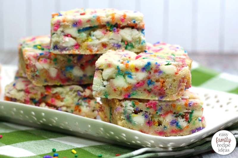 These Funfetti Cookie Bars are scrumptious. Load them up with rainbow sprinkles for a sweet tasty treat. Plus, Funfetti cake mix recipes are the perfect birthday party dessert. Pillsbury Funfetti Cookies and Cake Mix Cookies for your next party food.  