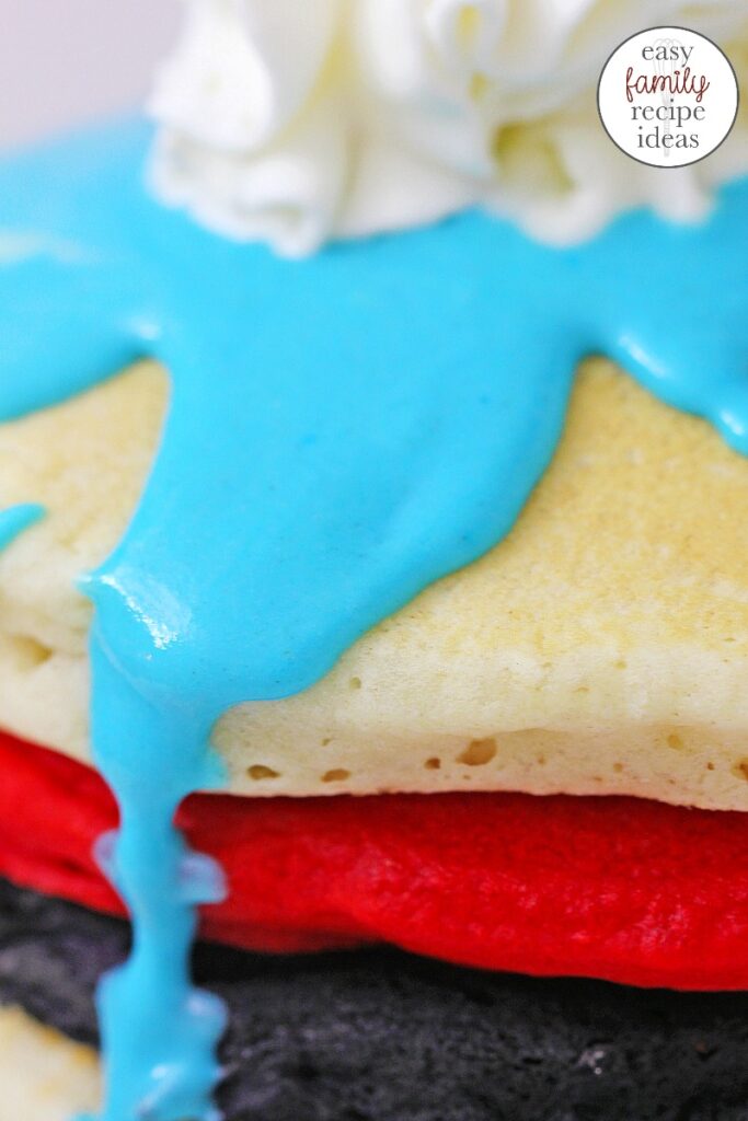 These Dr. Seuss Pancakes are AMAZING. Bright colors that remind you of your favorite Dr. Seuss Books. These Dr. Seuss Food Ideas are perfect for birthday party food idea or fun kid food. Bring on tasty Dr. Seuss Treats for Breakfast Please!  