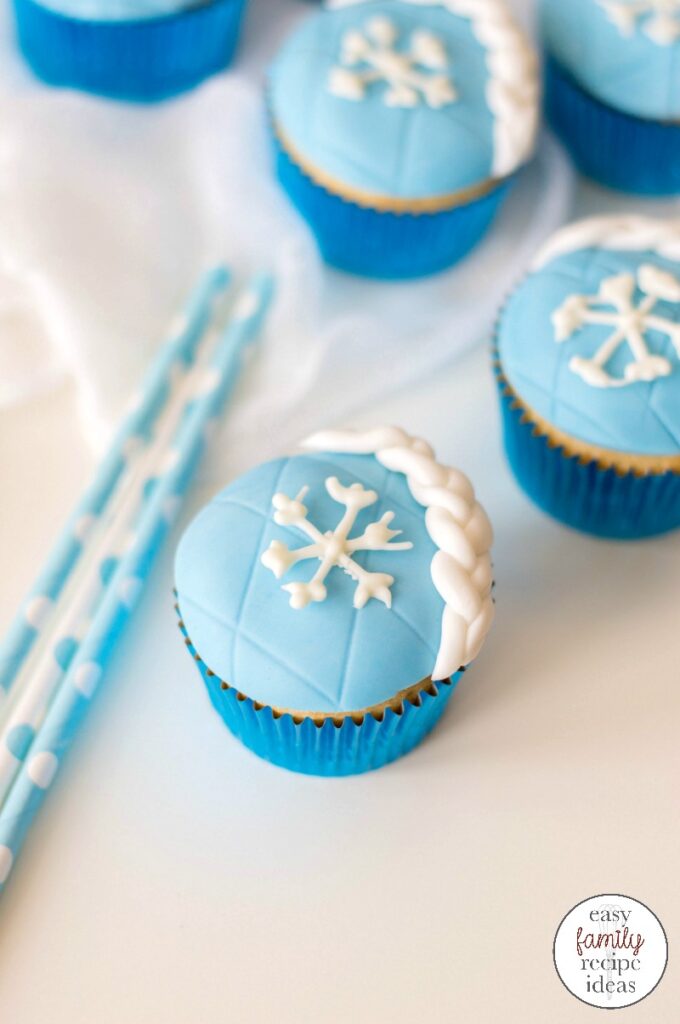 These Frozen Cupcakes are just in time for the new Frozen movie release! Make up a batch and get excited with all your Disney fans! Winter Cupcakes for a winter wonderland party or Elsa Cupcakes If you're looking for fun and festive cupcakes, these Easy Frozen cupcakes are simply amazing. Anyone who loves Elsa is going to go crazy over these gorgeous and tasty treats!