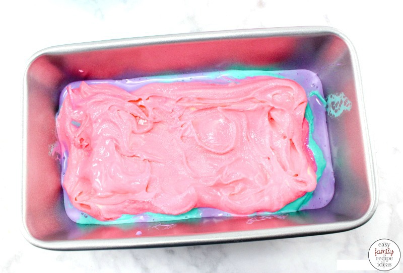 This unicorn ice cream recipe is so creative and Delicious! All the bright colors make this a great Unicorn treat to make up. If you're looking for a tasty frozen treat or throwing a magical unicorn themed party, you're going to want to try these delicious unicorn ice cream sundaes.