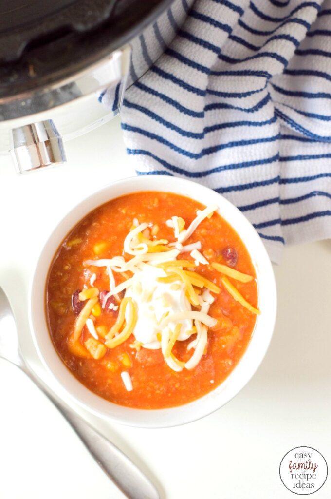 Cook up this Instant Pot Vegetarian Chili Recipe for a cold winter day. This Vegetarian Chili is Hearty and filling you don't need any meat to satisfy you. An Easy Instant Pot Chili that everyone Loves! 