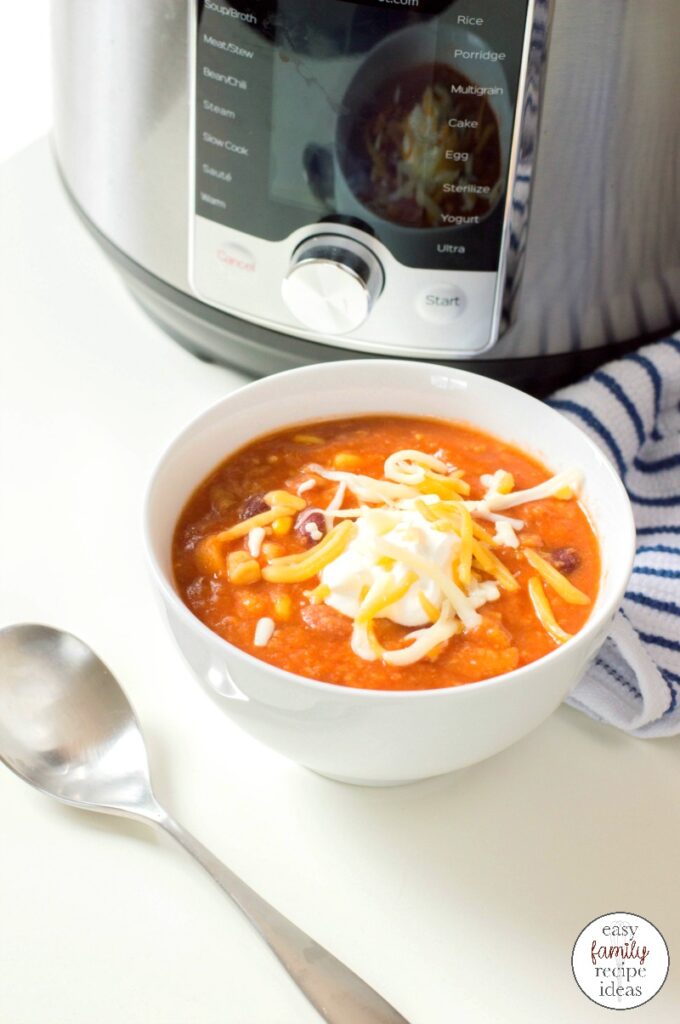 Cook up this Instant Pot Vegetarian Chili Recipe for a cold winter day. This Vegetarian Chili is Hearty and filling you don't need any meat to satisfy you. An Easy Instant Pot Chili that everyone Loves! 
