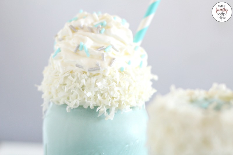 This Disney Frozen Themed Milkshake recipe is the perfect easy snack. And who doesn't love the taste of a delicious and creamy milkshake? Not only is it "cool" and yummy, but it's a festive Winter Wonderland Blue Milkshake for a fun winter snack. This Frozen inspired Milkshake is perfect for a Frozen Themed Party Food at your next Frozen birthday party or movie night.