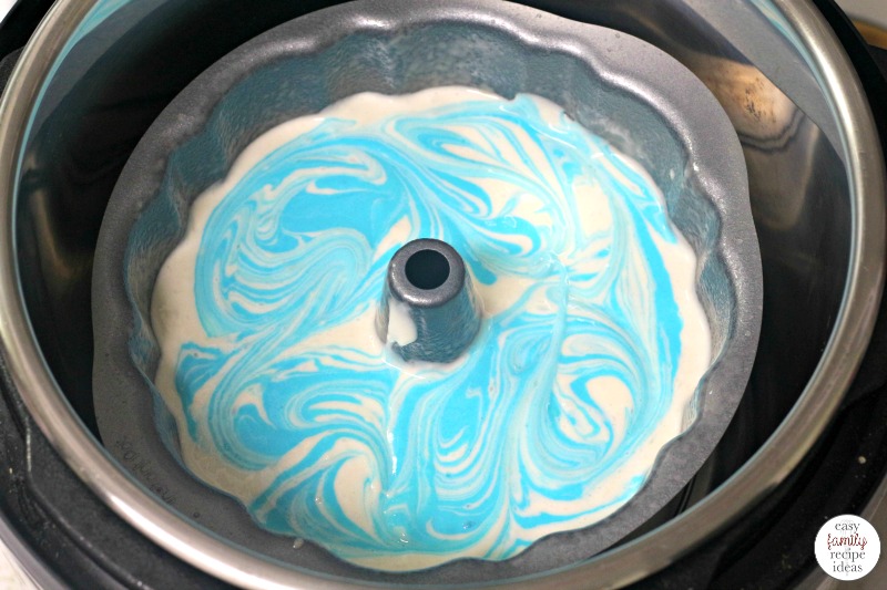 This Frozen Themed Bundt Cake is so simple. Cooking up this Easy Frozen Themed Cake in your Instant Pot makes it a total breeze! When you need the perfect winter wonderland cake idea, this is it! Perfect for a Frozen Themed Birthday Party or Frozen Movie Night snack