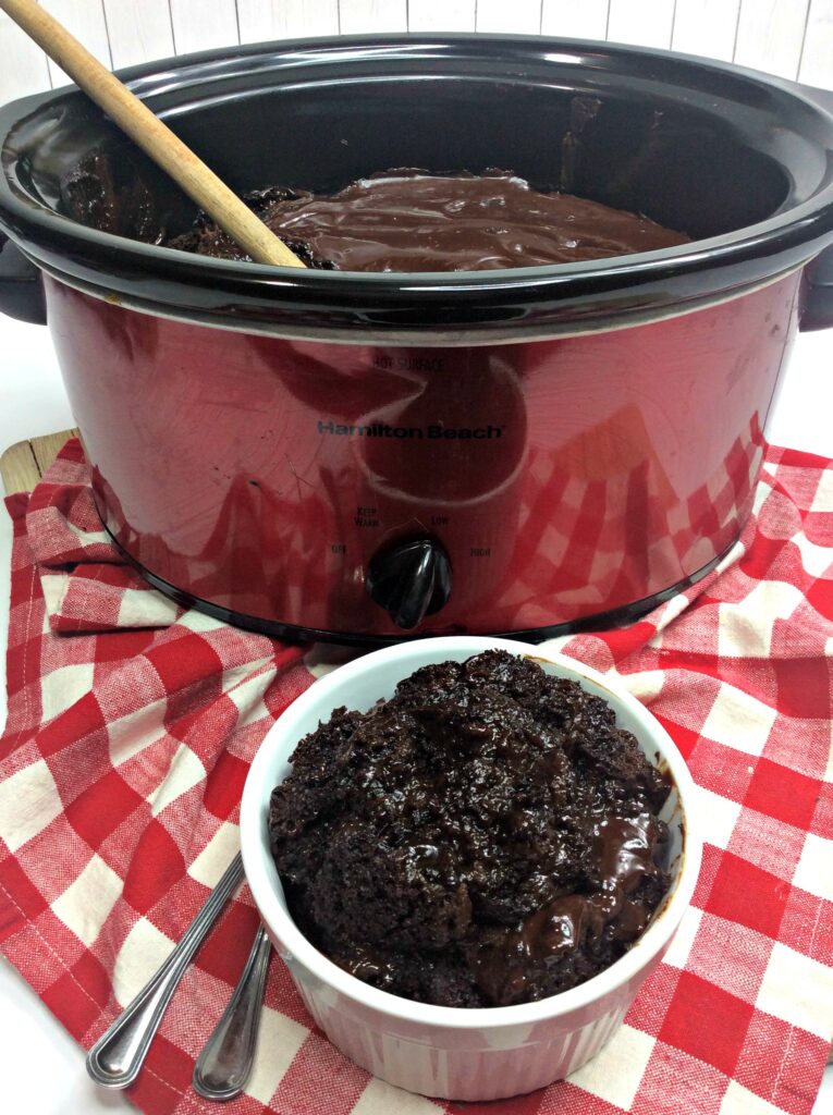 You're going to love this Slow Cooker Chocolate Lava Cake! It's as easy as adding in a few ingredients and turning on your crockpot! This Easy Crockpot Chocolate Lava Cake is so yummy and decadent your family will want you to make this all the time. 