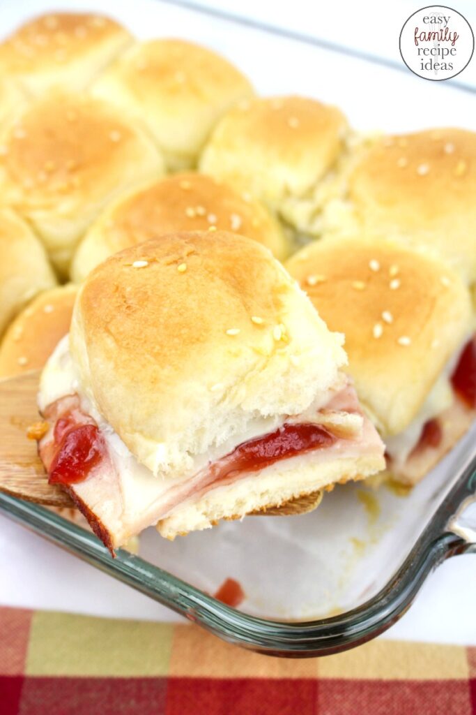 Get ready to fall in love with the ease of these Turkey Cranberry Sliders. They're so simple to make, you're going to make them again and again! Perfect to make with Thanksgiving Leftovers, THE MOST DELICIOUS turkey sliders on Hawaiian rolls with cranberry. Your family will LOVE the taste of these.