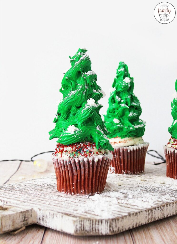 You'll be in the holiday spirit with these Christmas Tree Cupcakes! It's the perfect dessert to celebrate the holiday season! These Tasty and Easy Christmas Cupcakes will bring joy to everyone that see's and eats them. The Best Christmas Tree Cupcakes! 