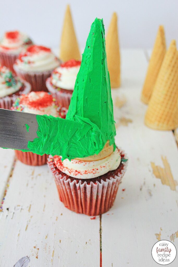 You'll be in the holiday spirit with these Christmas Tree Cupcakes! It's the perfect dessert to celebrate the holiday season! These Tasty and Easy Christmas Cupcakes will bring joy to everyone that see's and eats them. The Best Christmas Tree Cupcakes! 