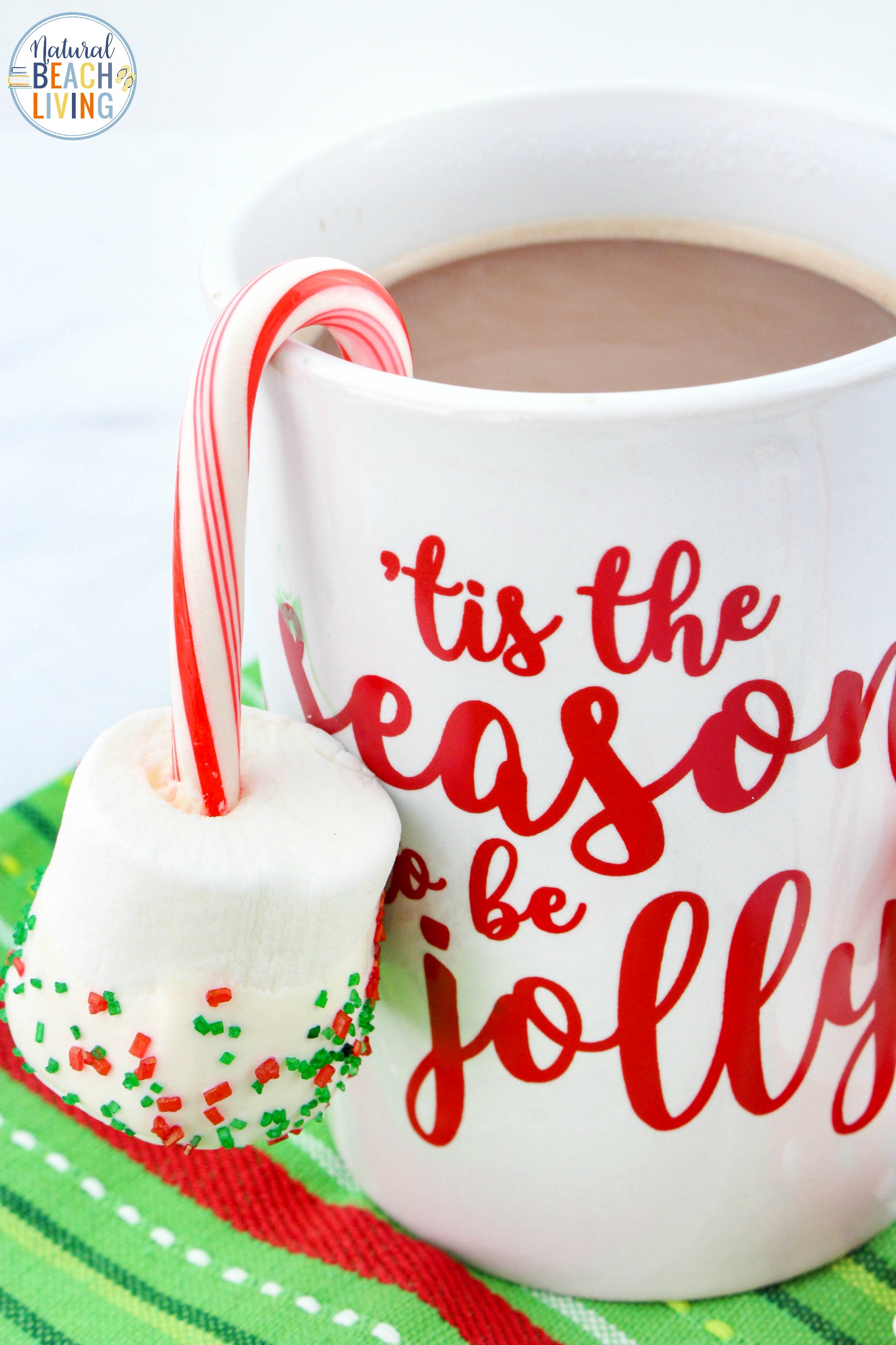These Candy Cane Marshmallow Hot Chocolate Dippers are so simple and only have 4 ingredients! It's a quick way to make a delicious winter treat! Easy Hot Chocolate Stirrersfor a snack on a Cold Winter Day. hot chocolate dippers recipe, Peppermint hot chocolate dippers, candy cane hot chocolate dippers, candy cane marshmallow pops