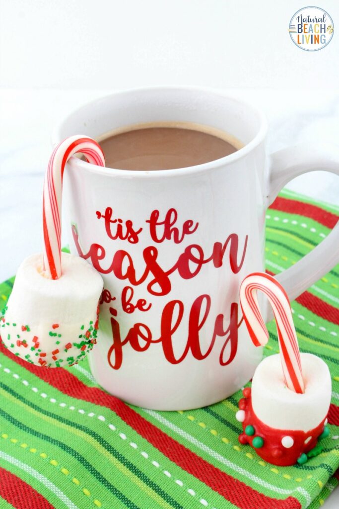 These Candy Cane Marshmallow Hot Chocolate Dippers are so simple and only have 4 ingredients! It's a quick way to make a delicious winter treat! Easy Hot Chocolate Stirrersfor a snack on a Cold Winter Day. hot chocolate dippers recipe, Peppermint hot chocolate dippers, candy cane hot chocolate dippers, candy cane marshmallow pops