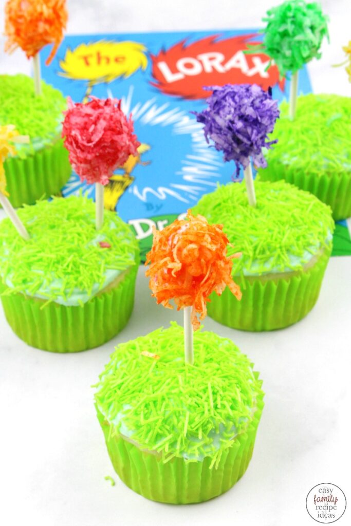 Have fun making these Truffula Tree Cupcakes! The Lorax Truffula Tree Cupcakes are tasty treats every child loves. And with Dr. Seuss day coming up on March 2nd these super cute Dr. Seuss cupcakes are perfect for any type of Dr. Seuss party food as well! 