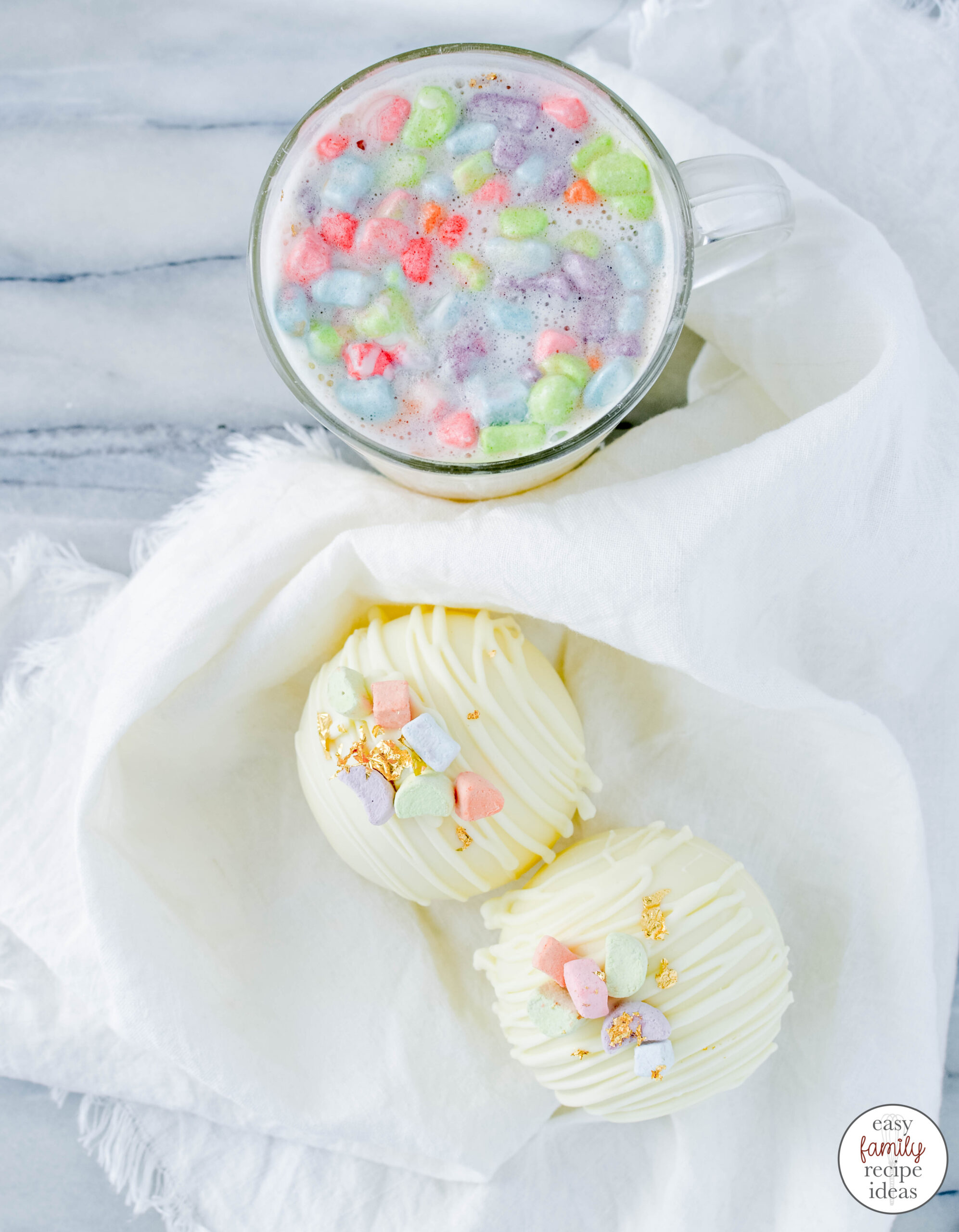 These Hot Cocoa Bombs with Lucky Charms are so good! Learn How to Make Pot of Gold White Chocolate Bomb for St. Patrick's Day or for a Spring Treat, Serve up White Chocolate Hot Chocolate Bombs and St. Patrick's Day Hot Chocolate Bombs to your friends and family 
