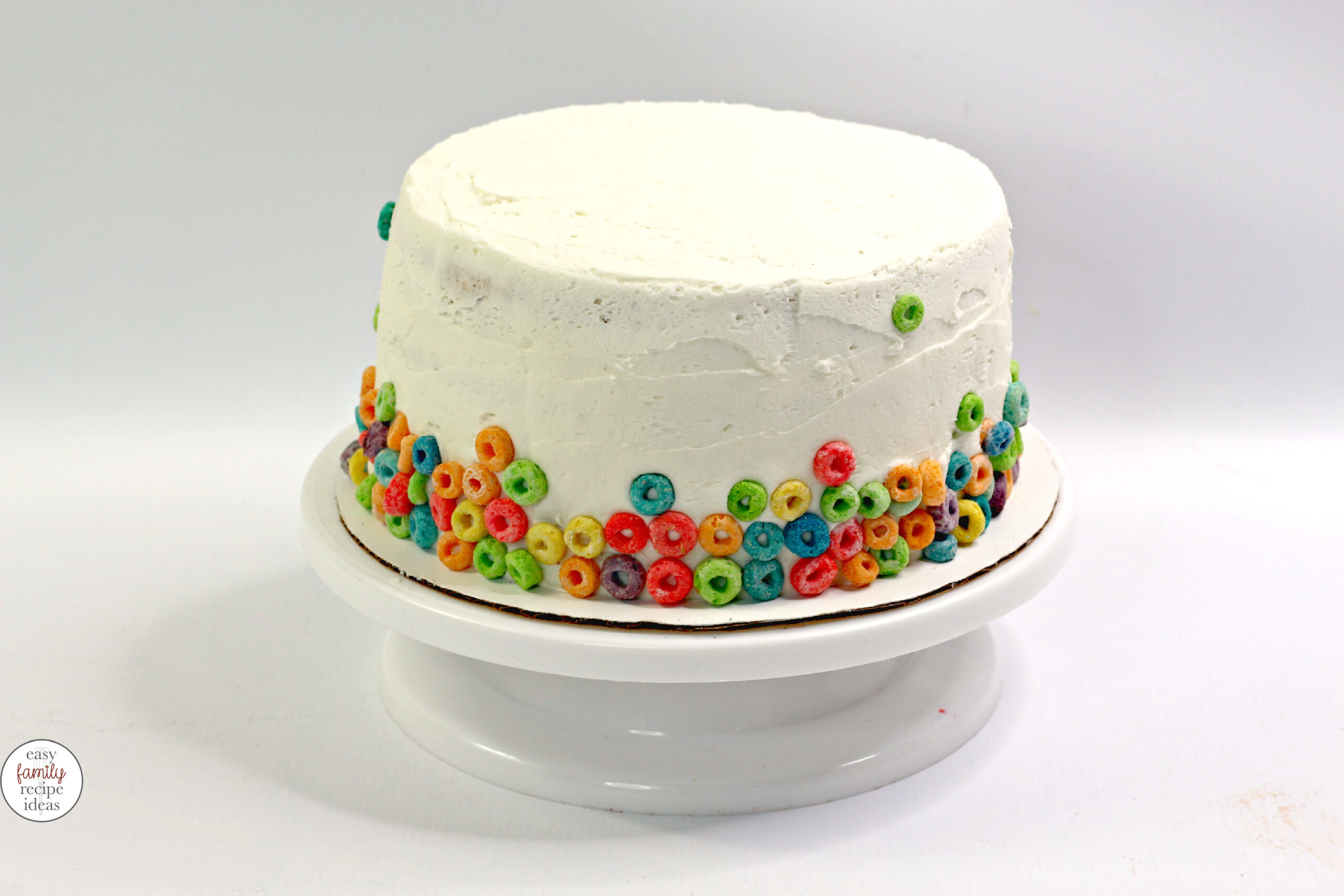 This Froot Loops Cake is a showstopper! If you’re kids are a fan of Froot Loops cereal this Easy Cereal Cake recipe is perfect for a birthday party, or surprise celebration. Bake a delicious Milk and Cereal Cake Recipe today. Splash Cake