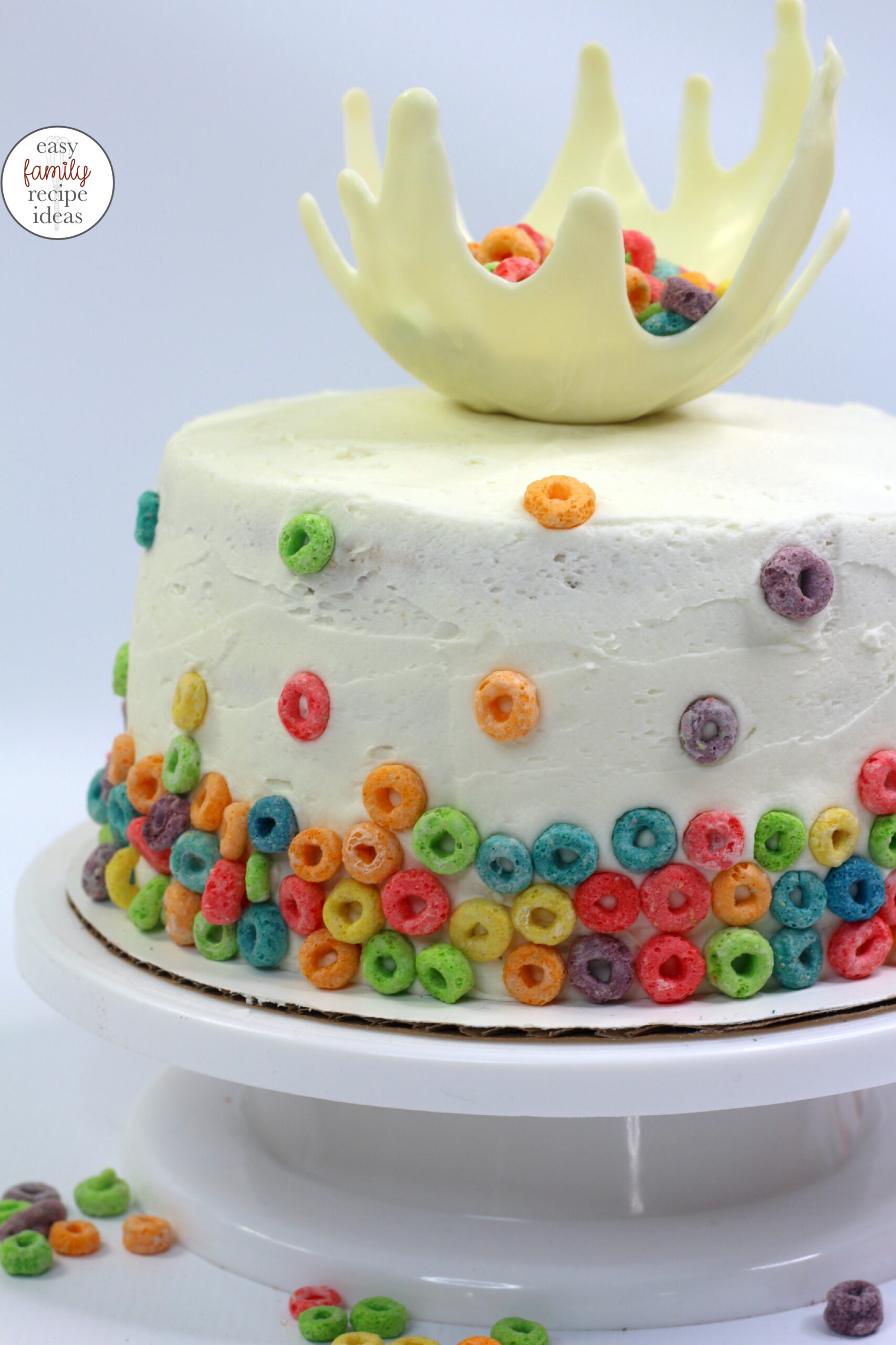 This Froot Loops Cake is a showstopper! If you’re kids are a fan of Froot Loops cereal this Easy Cereal Cake recipe is perfect for a birthday party, or surprise celebration. Bake a delicious Milk and Cereal Cake Recipe today. Splash Cake