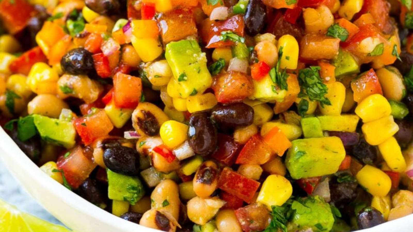 Mexican black bean and corn salad in a white bowl.
