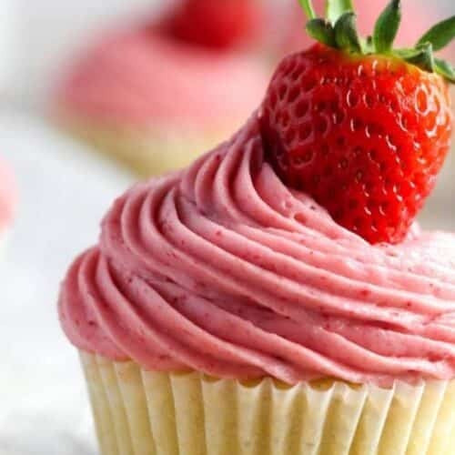 Strawberry-Filled Cupcakes recipe by Savor The Spoonful.